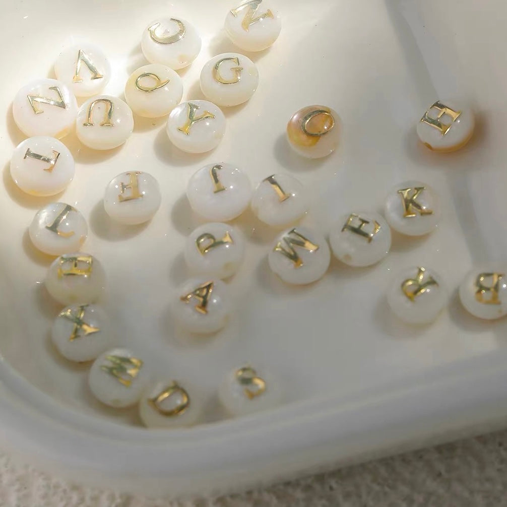24-Letter Trochus Round Shell Beads