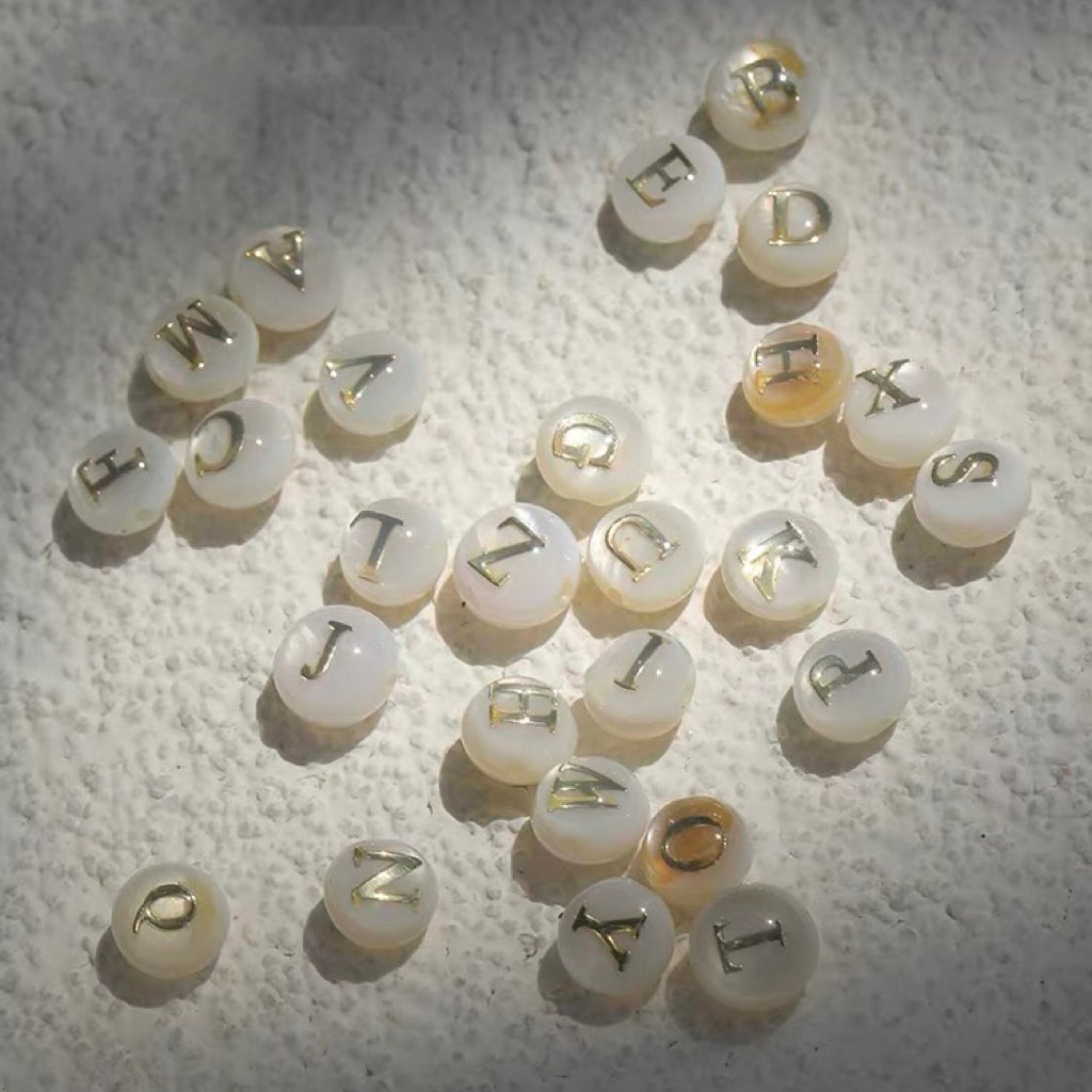 24-Letter Trochus Round Shell Beads