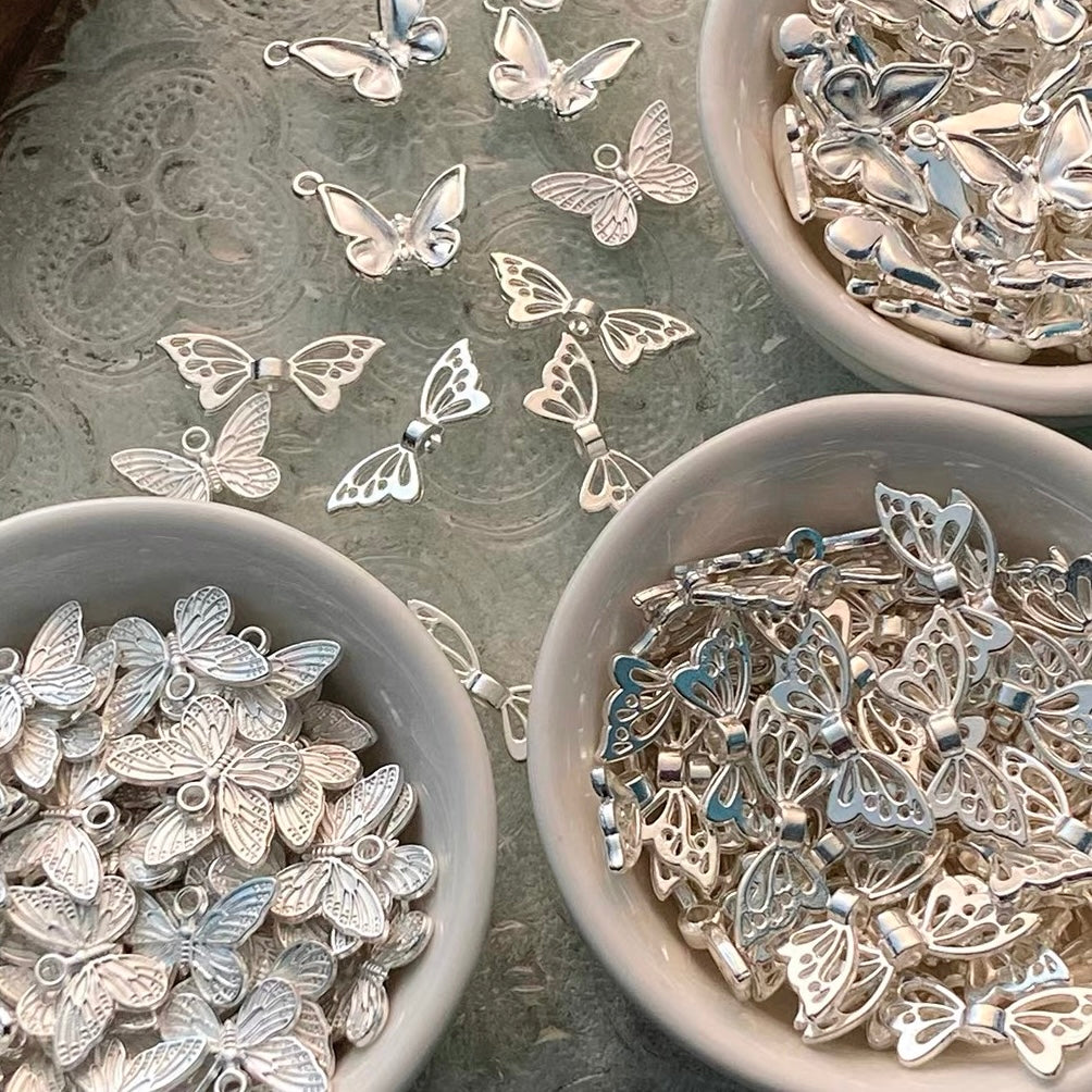 Butterfly Pendant Beads Strung with Alloy Plated in Bright Silver