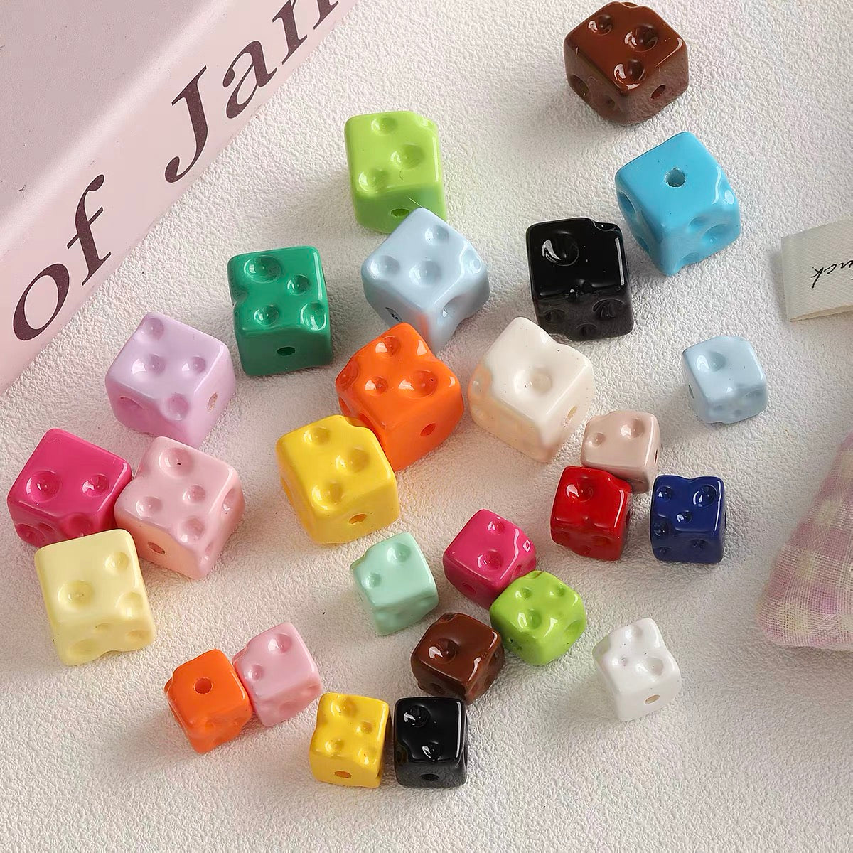 Colorful baked-enamel cheese bead