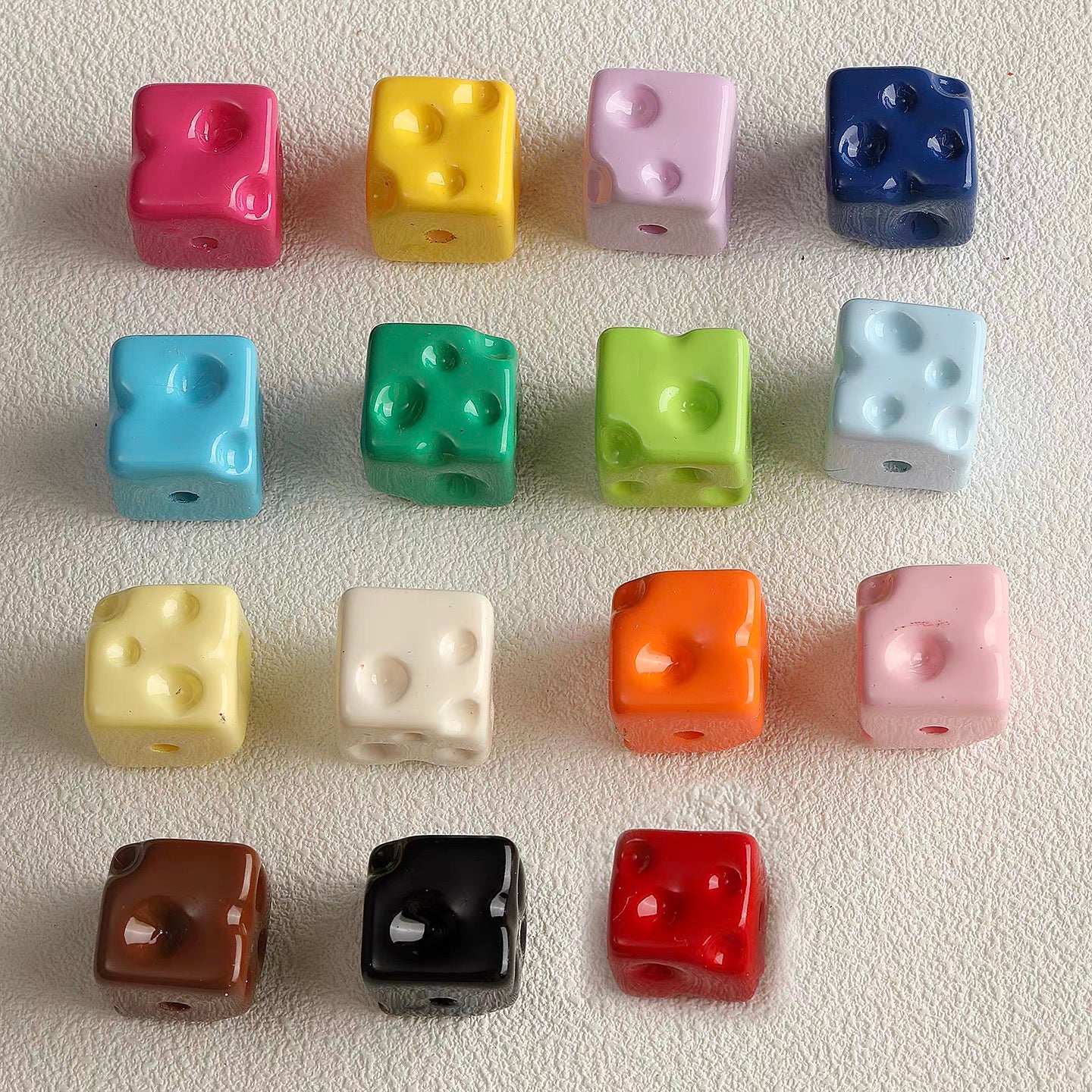 Colorful baked-enamel cheese bead