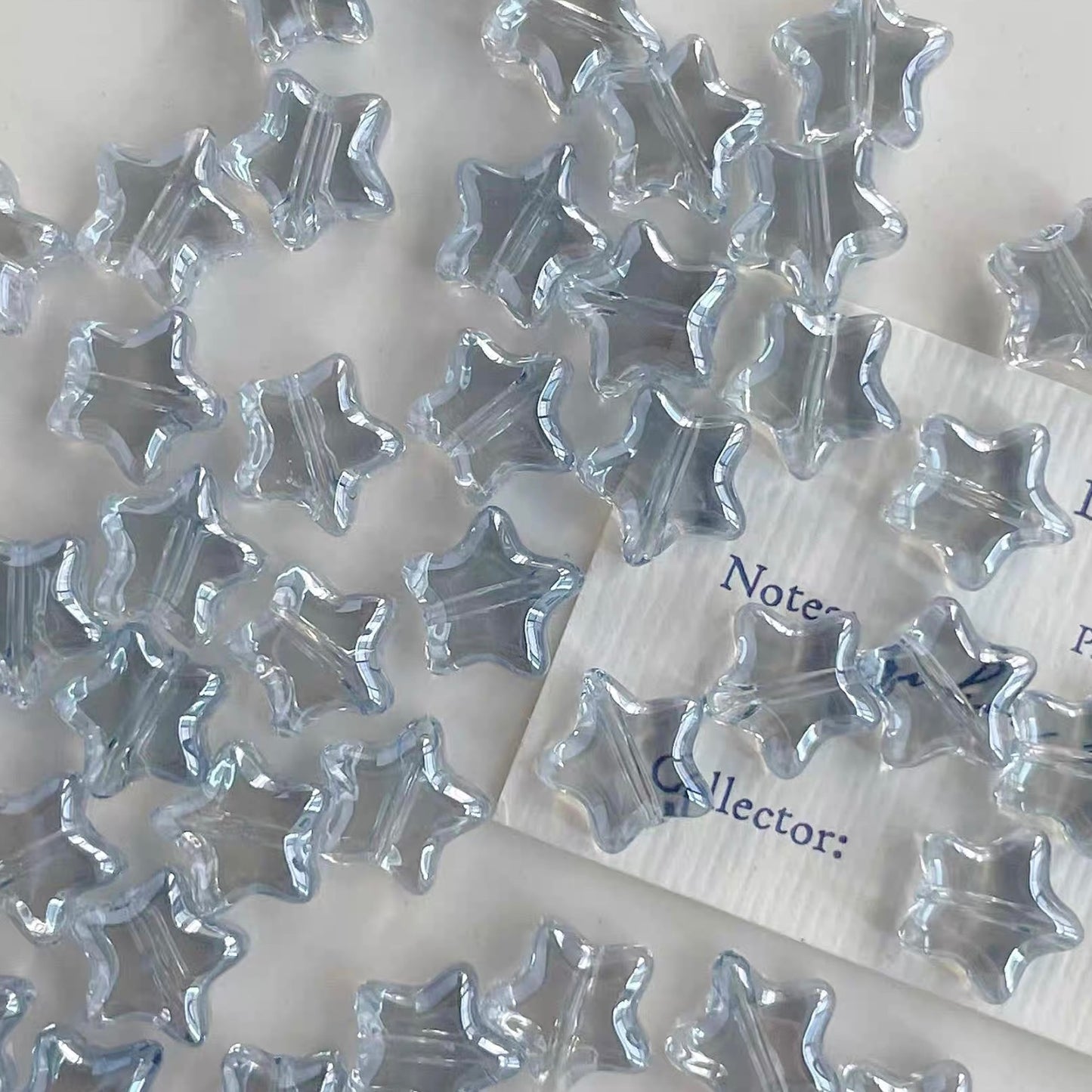 Rainbow-plated Star-shaped Glass Beads