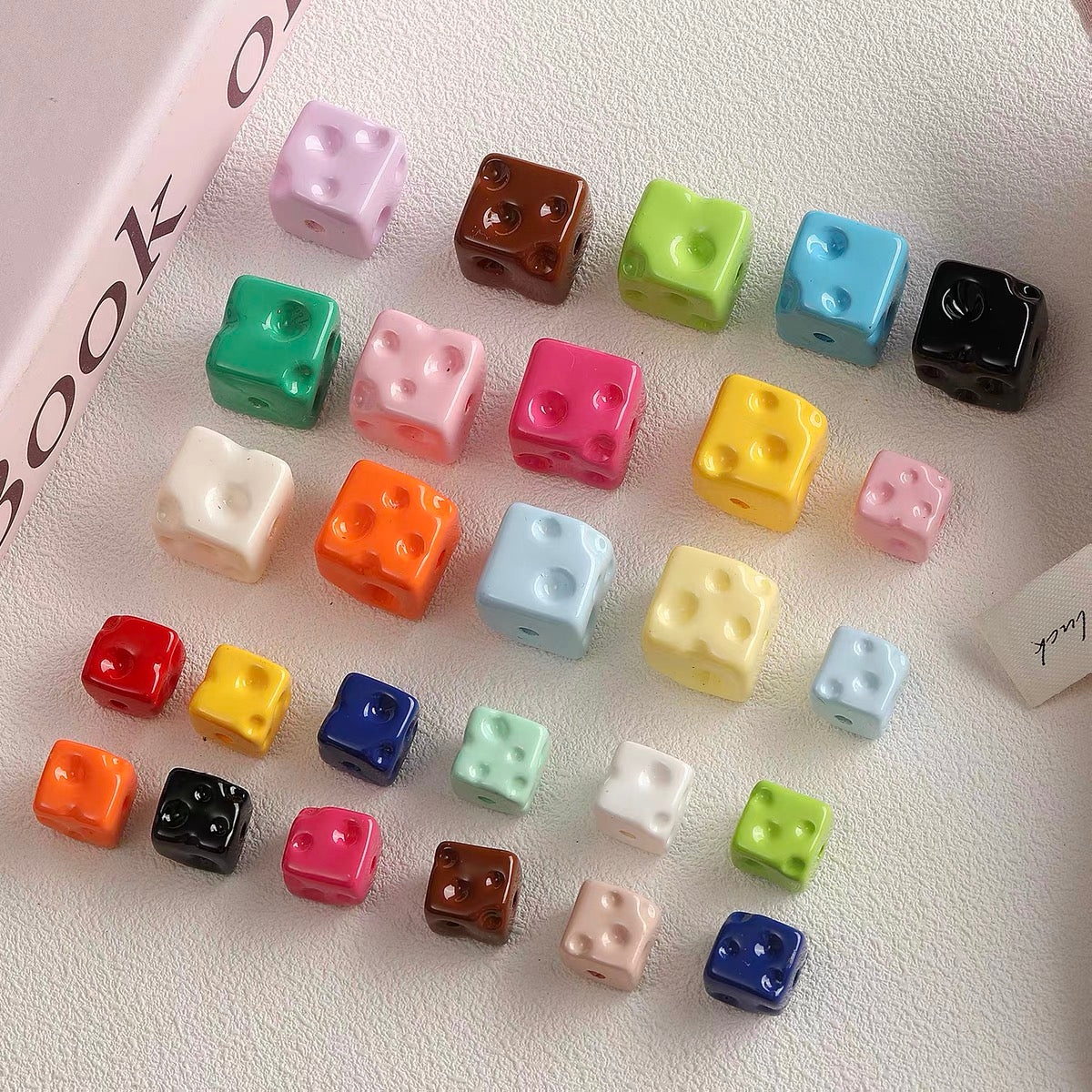 Colorful baked-enamel cheese bead