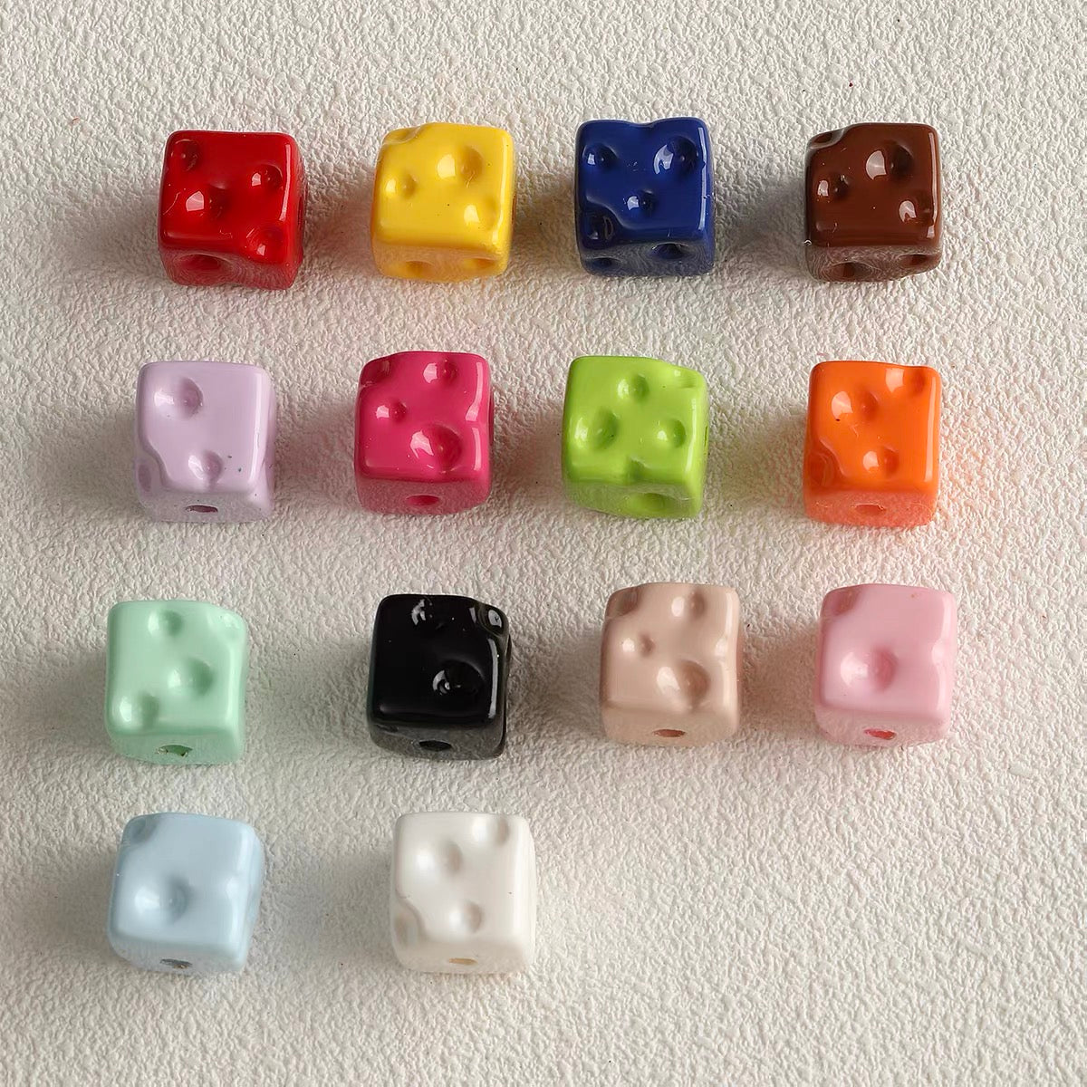 Colorful baked-enamel cheese bead